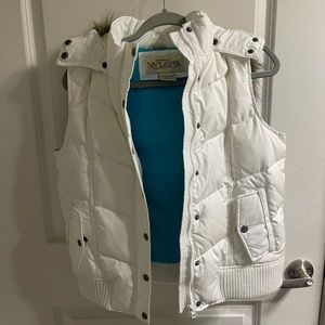 White puffy vest with removable fur hood
